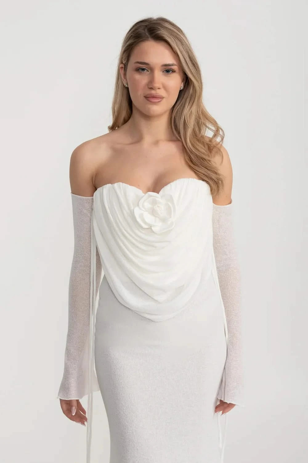 Elegant Flowing Dress With Long Sleeves, Top Draping And Central Rose Adornment - White