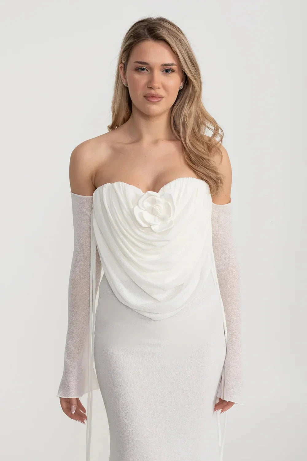 Elegant Flowing Dress With Long Sleeves, Top Draping And Central Rose Adornment - White
