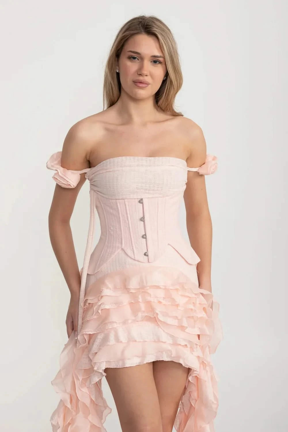 Vintage Inspired Corset Dress With Ruched Bustier And Flowing Ruffled Side Details - Pink