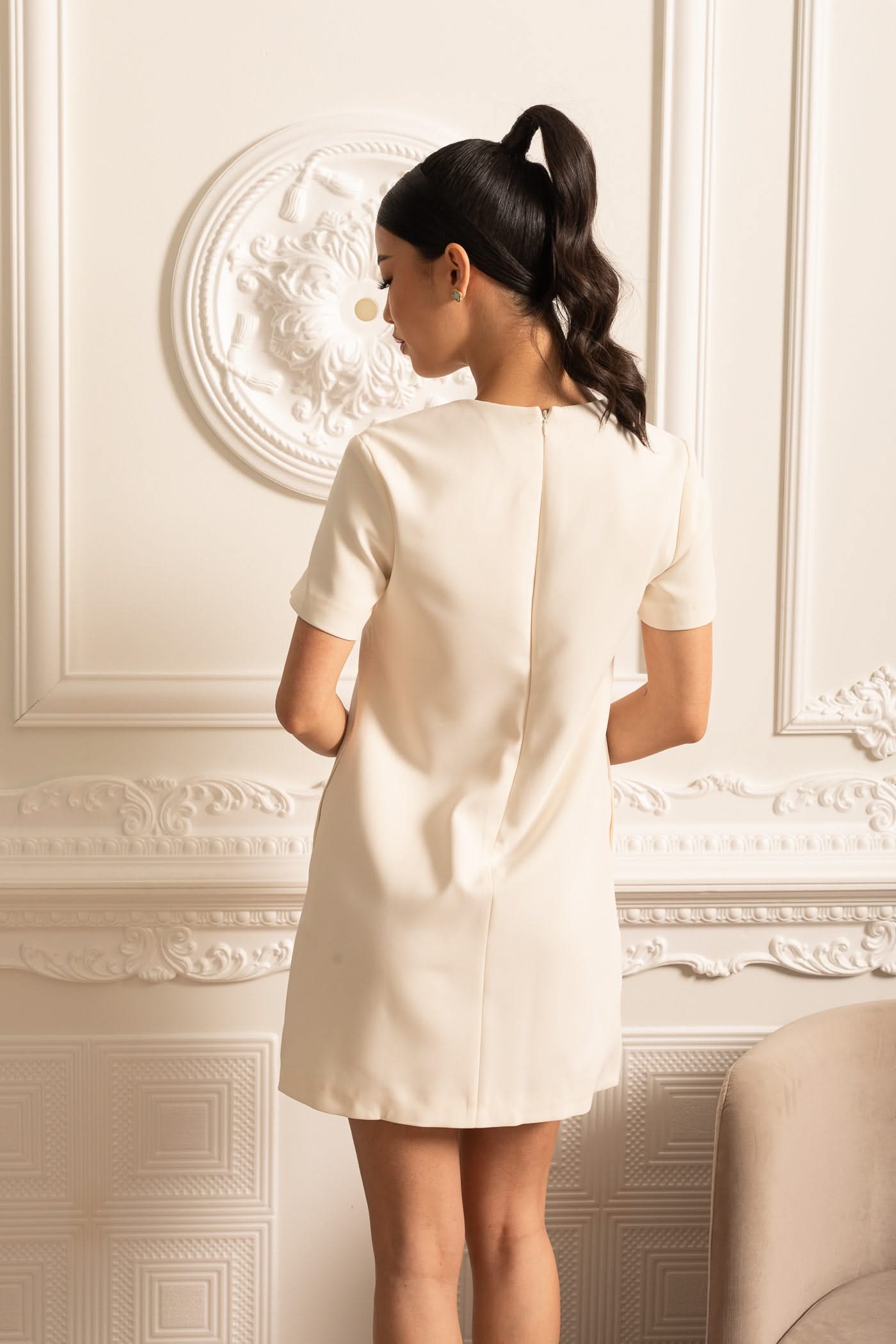 White Short Sleeved Mini Dress With Sparkling Neckline Bows