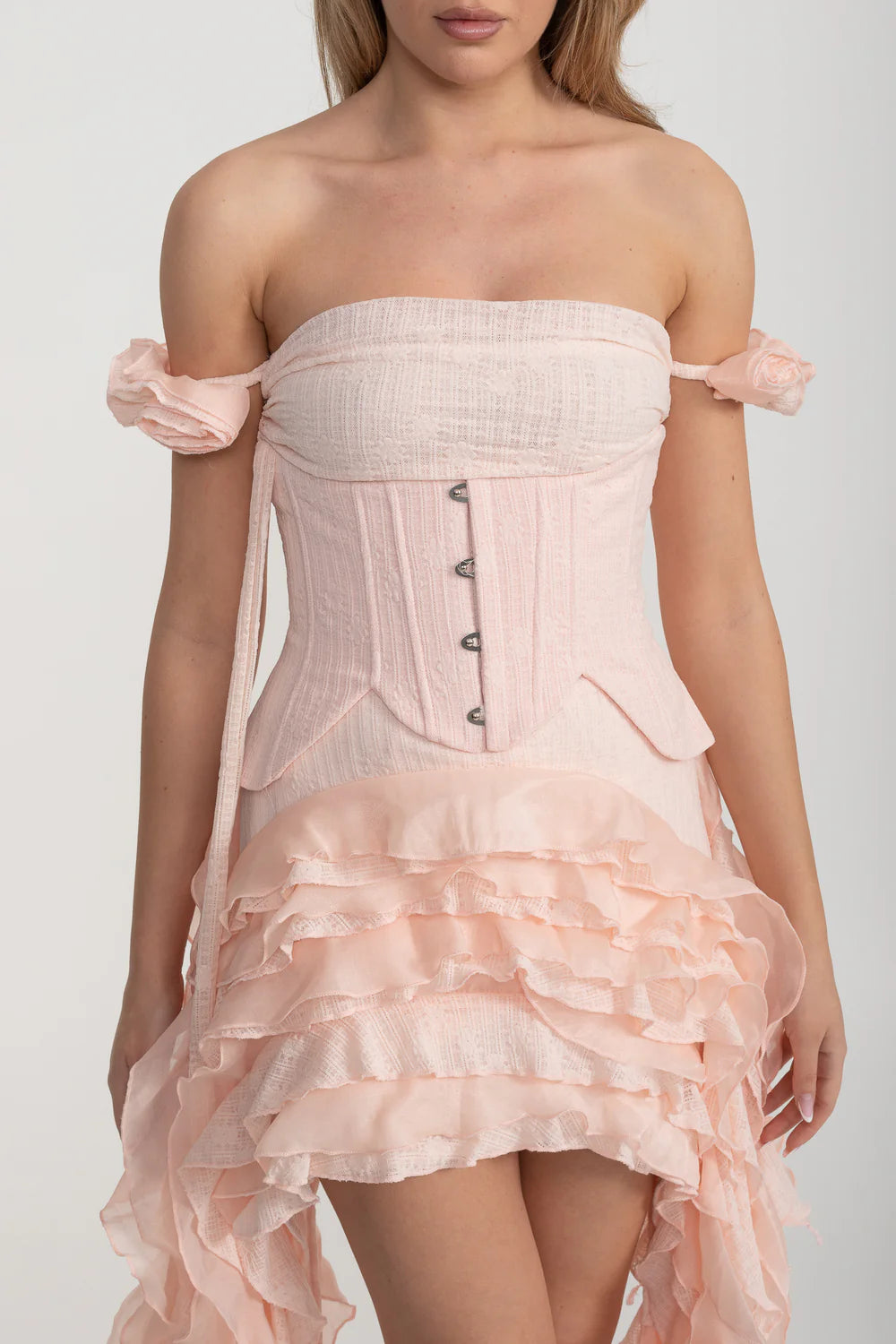 Vintage Inspired Corset Dress With Ruched Bustier And Flowing Ruffled Side Details - Pink