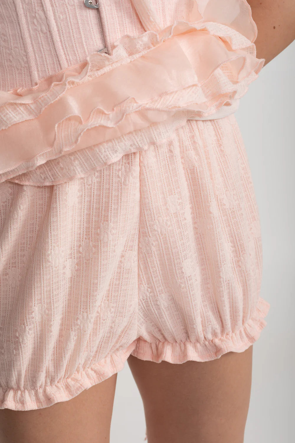 Vintage Inspired Corset Dress With Ruched Bustier And Flowing Ruffled Side Details - Pink