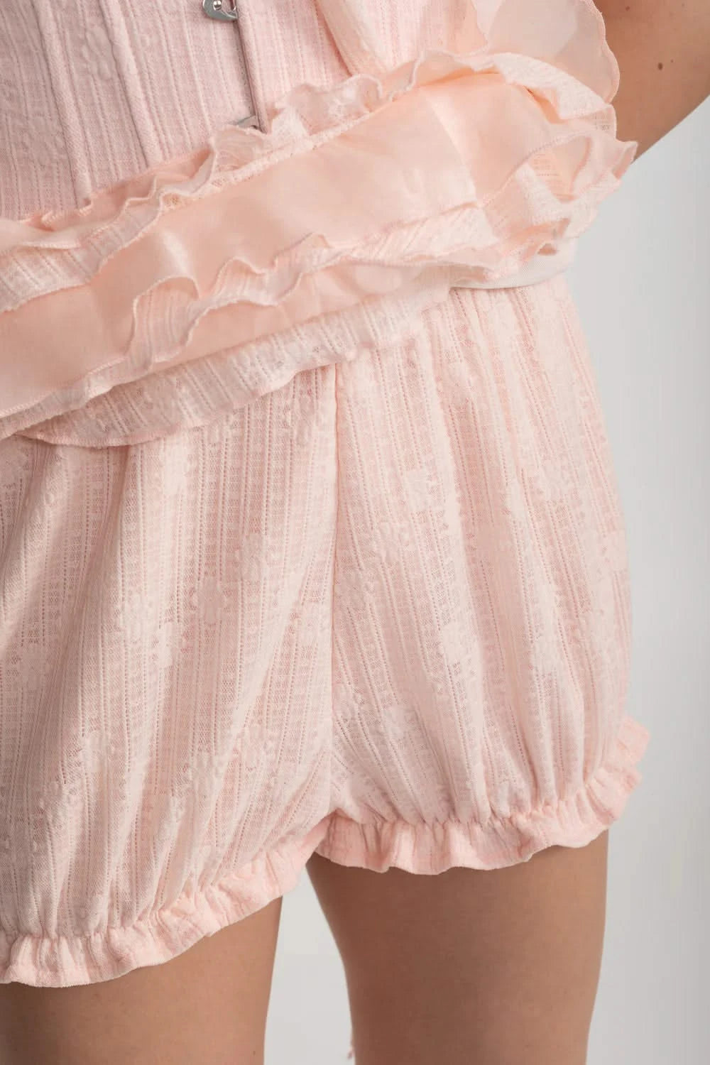 Vintage Inspired Corset Dress With Ruched Bustier And Flowing Ruffled Side Details - Pink