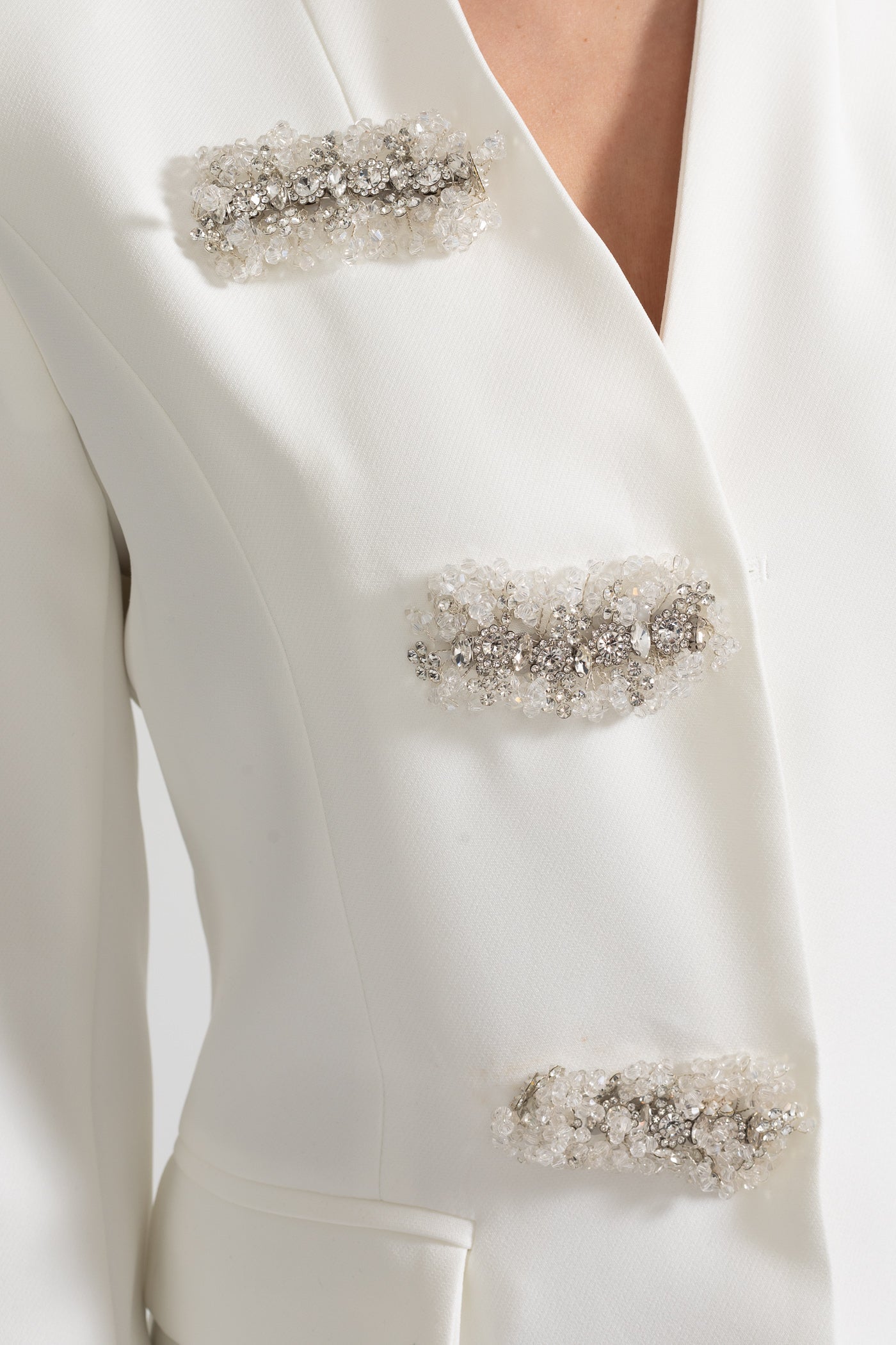 Tailored Blazer With Structured Shoulders And Silver Floral Clasps - White
