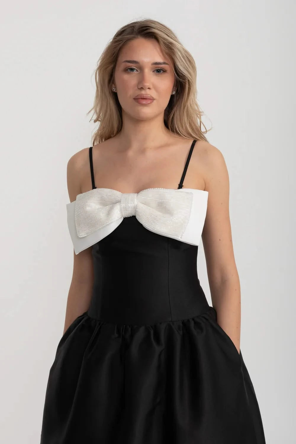 Fitted Sleeveless Mini Dress With Prominent Large White Bow - Black
