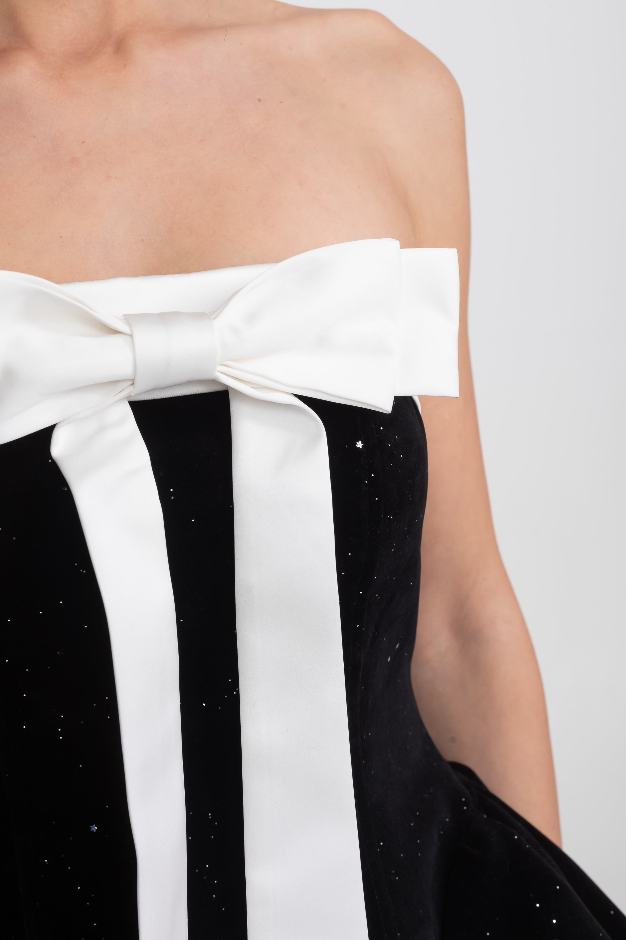 Strapless Velvet Mini Dress With Satin Bow And Ruffle Hem - Black
