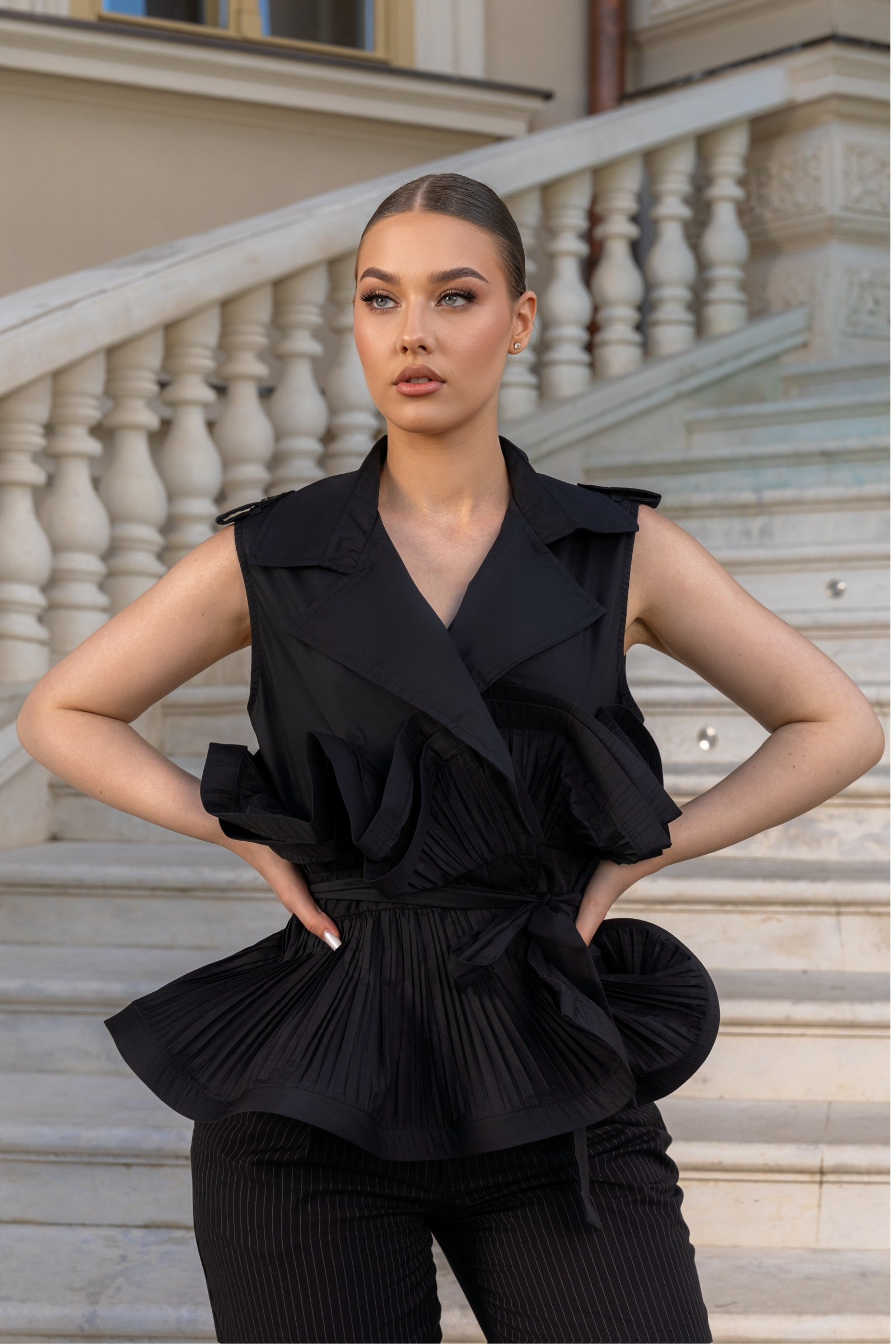 black sleeveless ruffle top