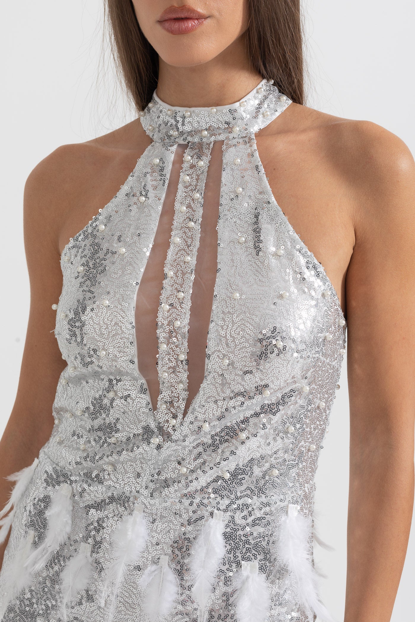 Shimmering Sequin Mini Dress With Front Cutouts And Feathers - Silver