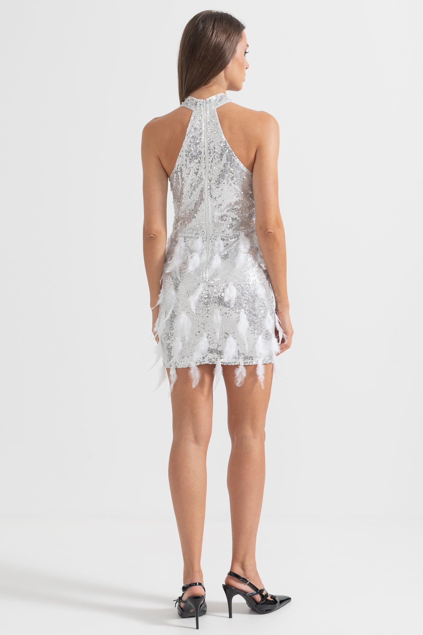 Shimmering Sequin Mini Dress With Front Cutouts And Feathers - Silver