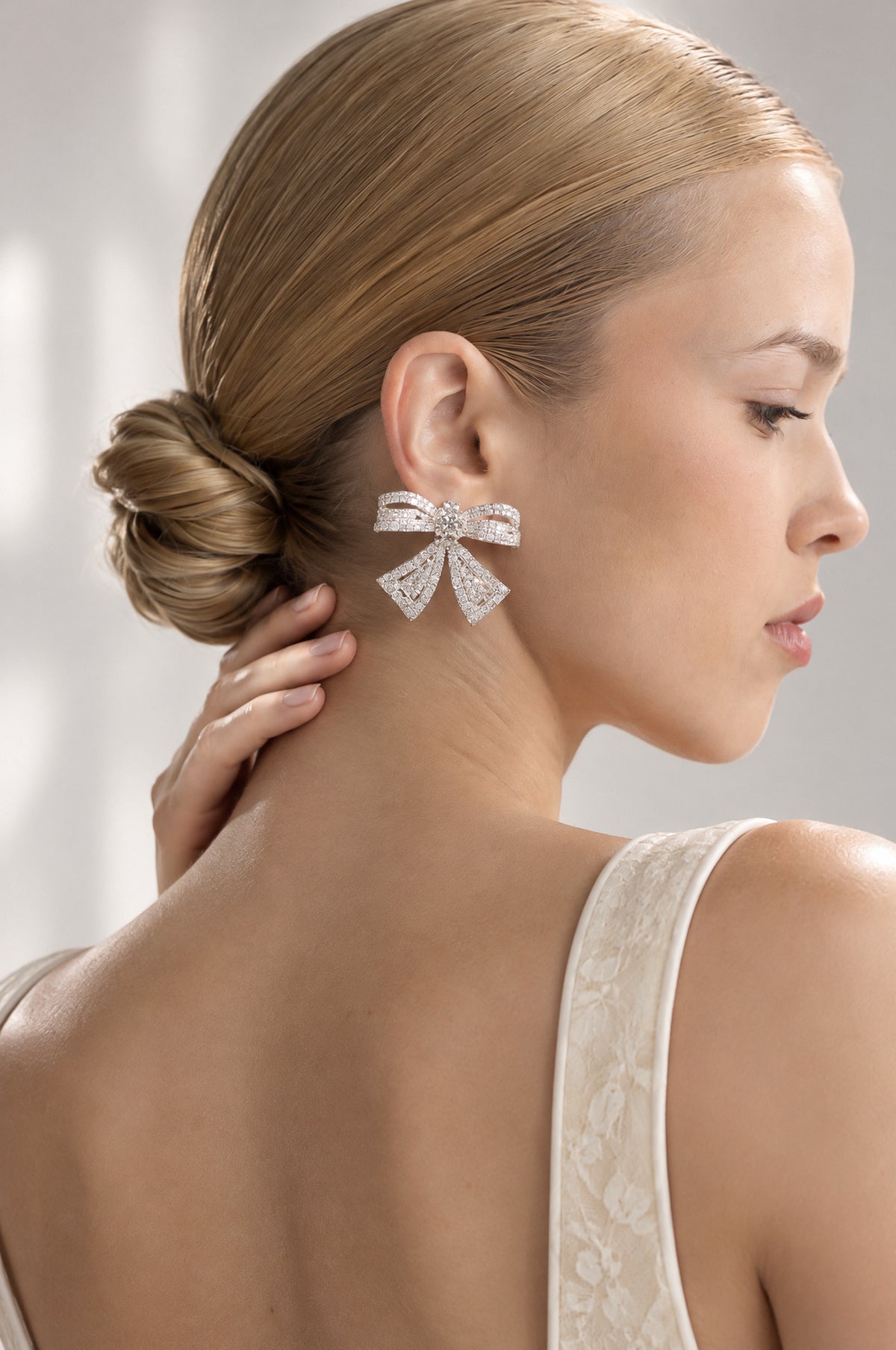 Crystal Bow Statement Earrings - Silver