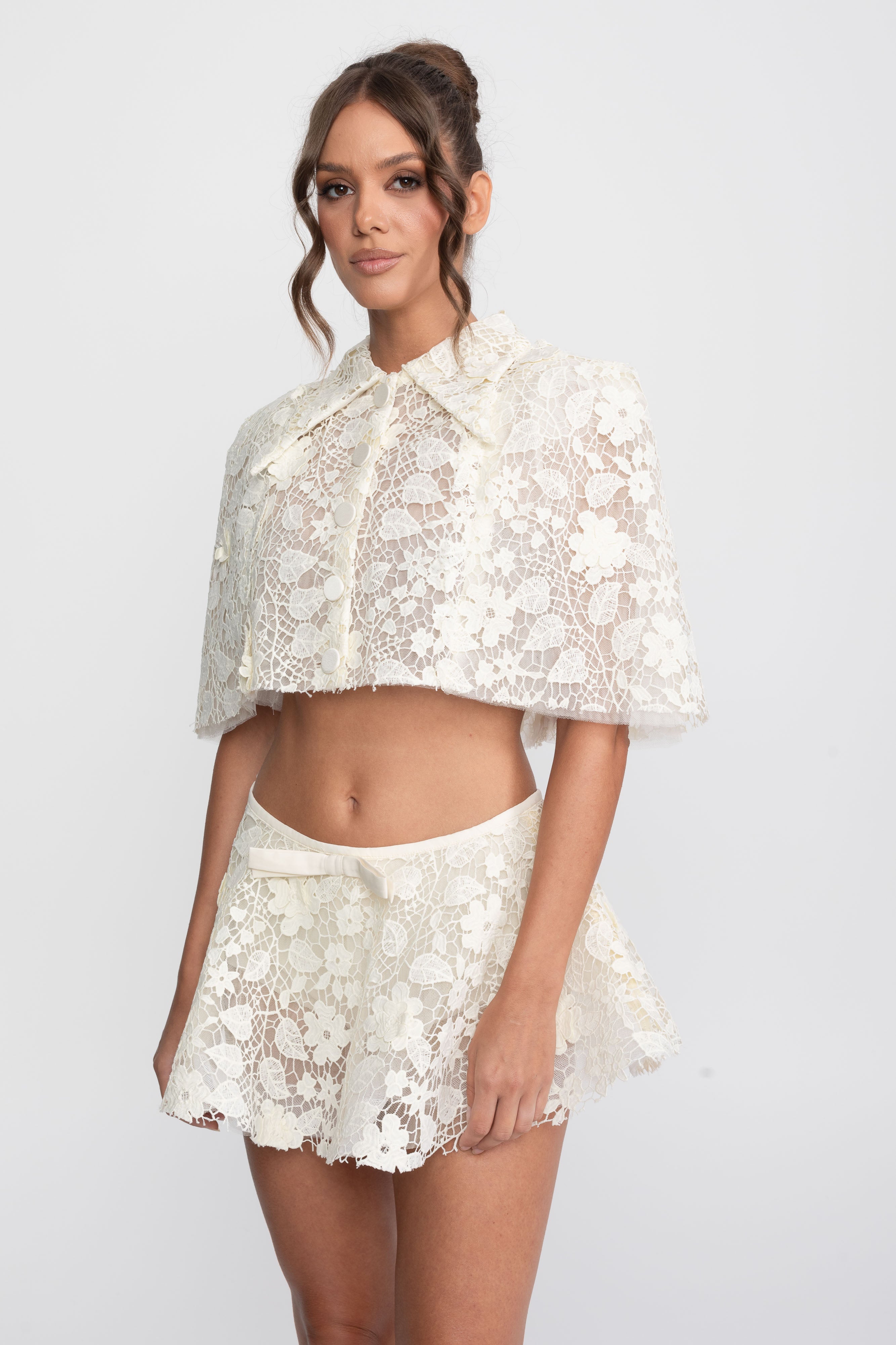 Lace Co-Ord Set With Button Cape And Bow Mini Skirt - Ivoire